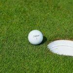 golf ball and a hole