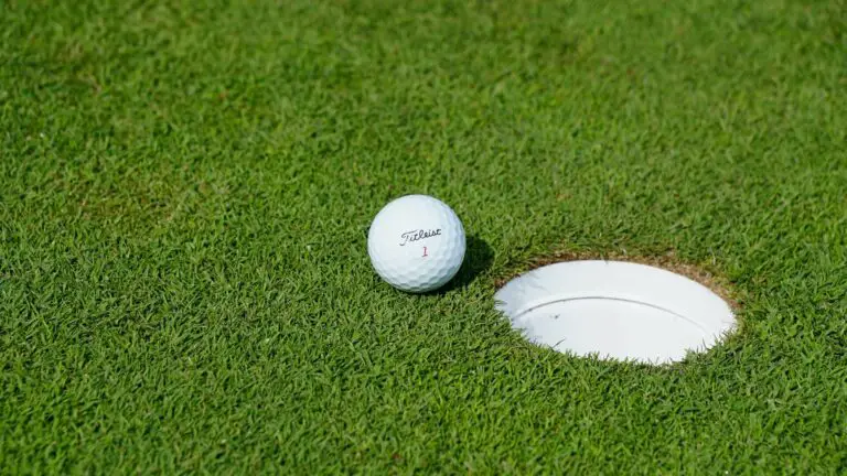 golf ball and a hole
