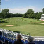 A golf tournament view from the bleachers