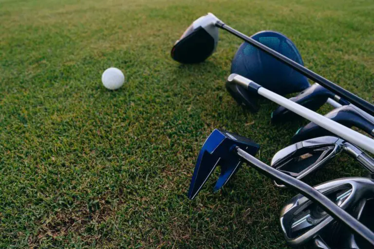 A close-up shot of golf clubs and a golf ball