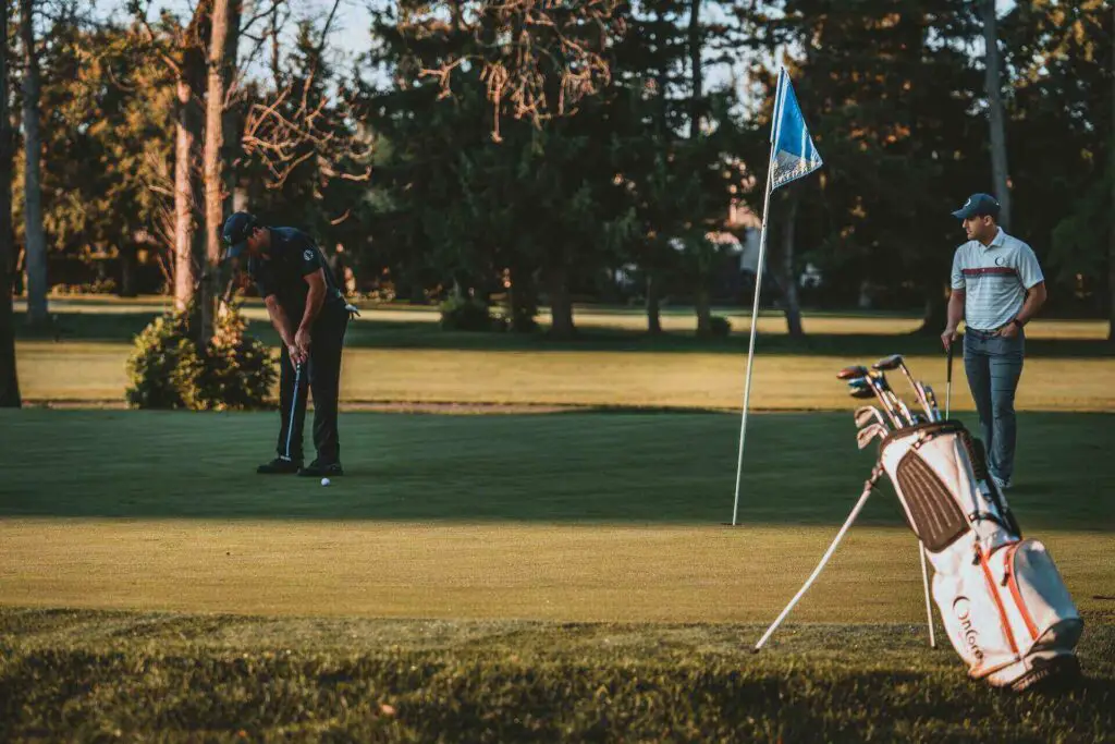 Two golfers playing a tournament