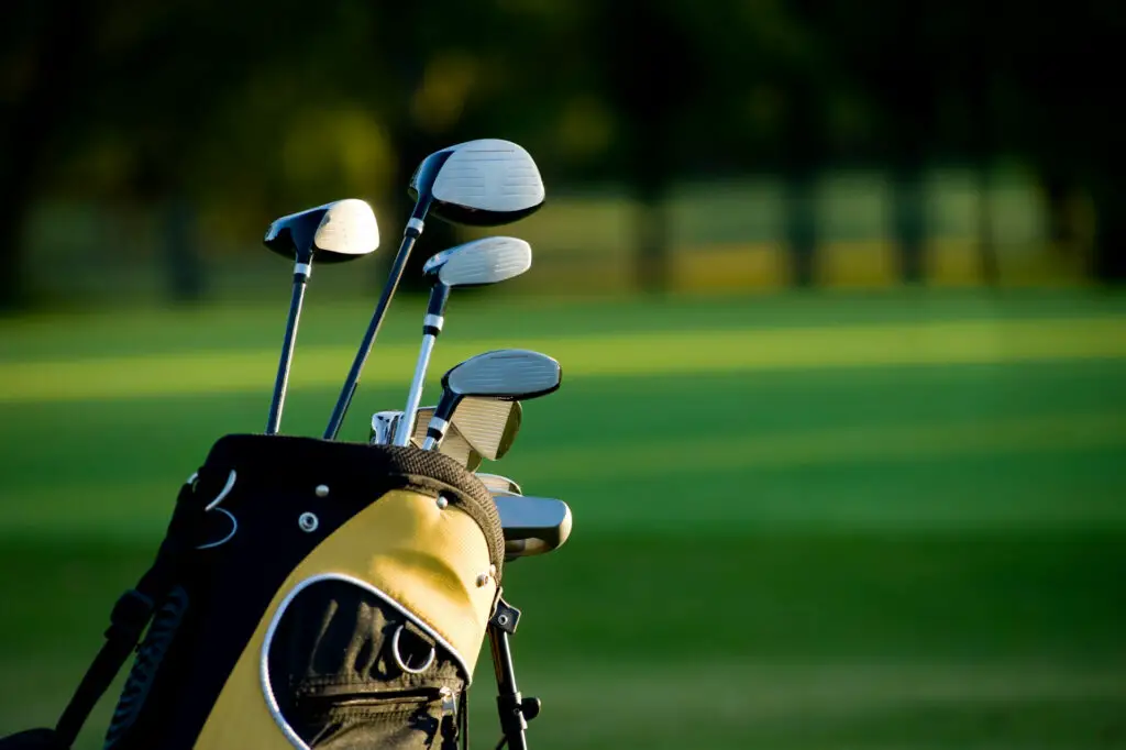 Bag with golf clubs on a golf course