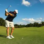 A man playing golf